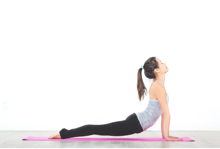 Mal di schiena e fitness: stretching e yoga